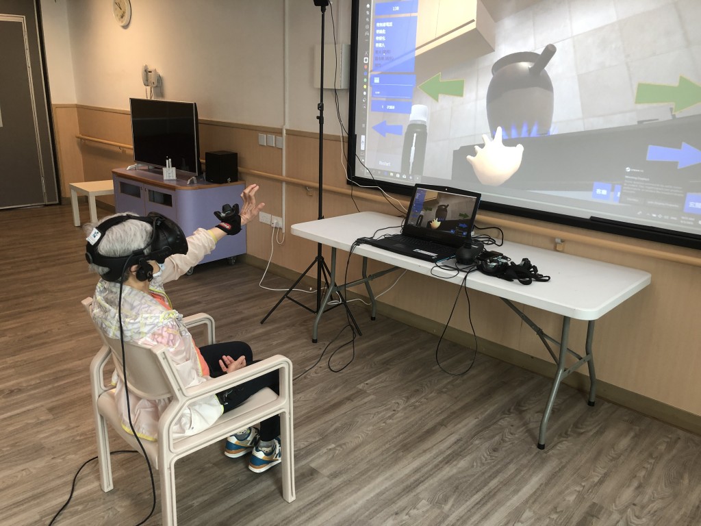 Photo 2: “VRehab Generation” Project developed a set of VR training programme kit, providing service users a close-to-reality training environment.