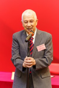 图二为广西培贤国际职业学院董事长何厚煌博士致辞。